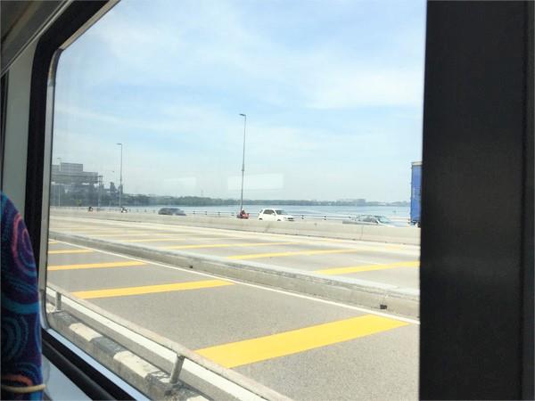 The Bridge from Window View In JB to Singapore Train