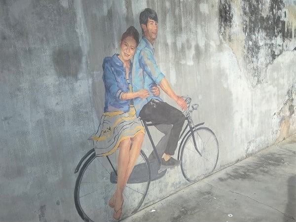 The boy and girl on a bicycle mural